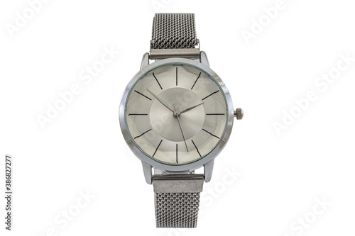 Women's round silver classic watch with metal mesh style strap, white dial face isolated on white background.
