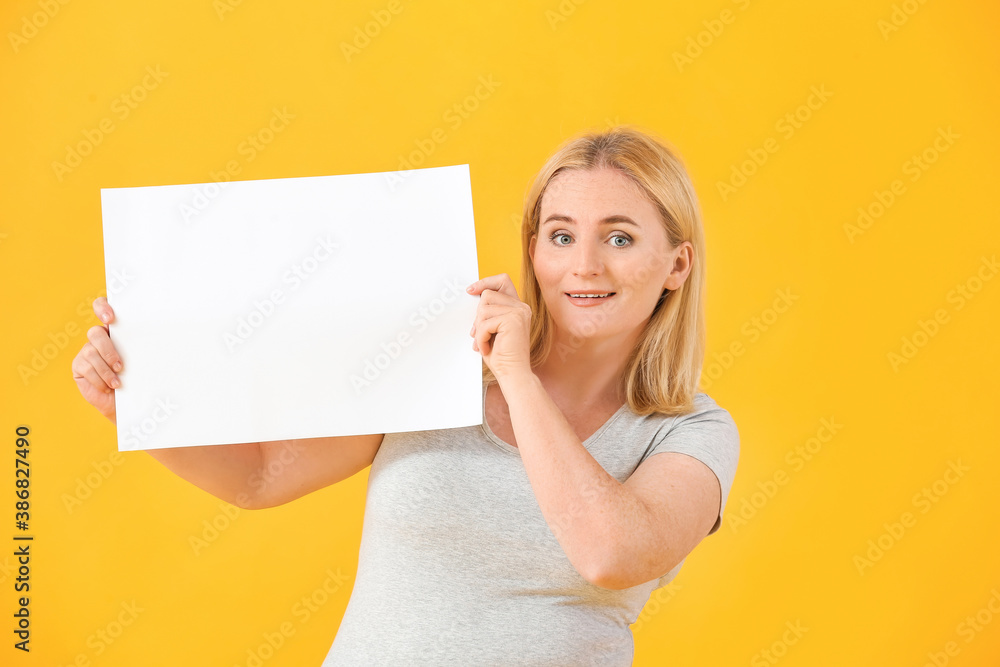 Woman with blank paper sheet on color background Woman with blank paper sheet on color background