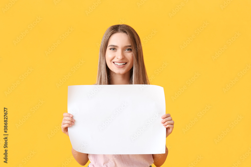 Young woman with blank paper sheet on color background Young woman with blank paper sheet on color background