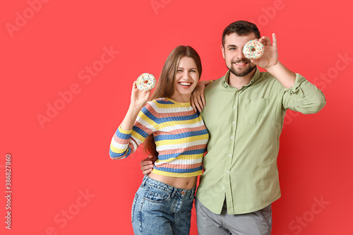 Young couple with sweet don...