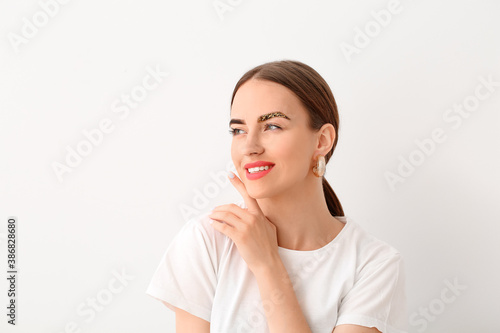 Young woman with creative e...