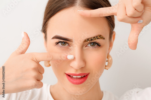Young woman with creative e...