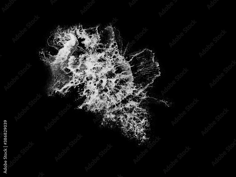 Obraz premium Stock image of water splash: High resolution water splashes isolated on black background. Royalty high-quality free stock photo image of water splash with bubbles of air on the black background