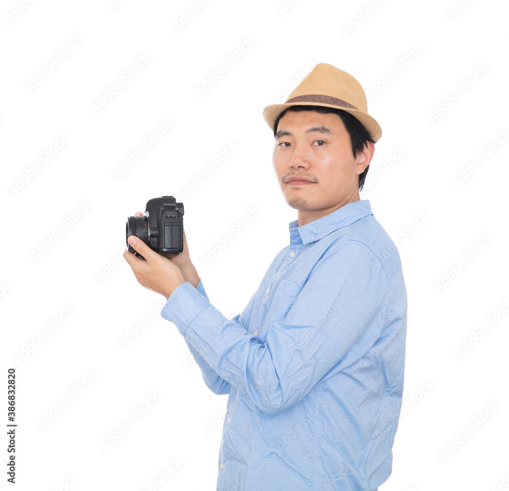 Male photographer holding DSLR camera in hand Male photographer holding DSLR camera in hand