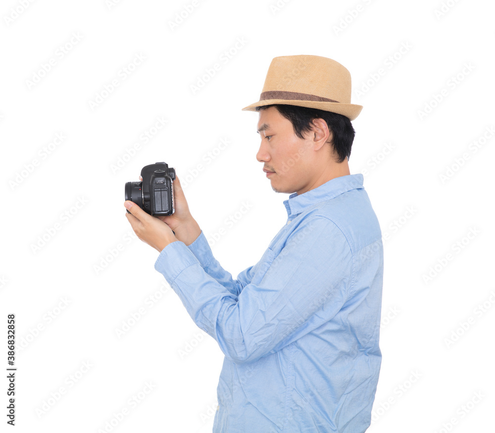 Male photographer holding DSLR camera in hand Male photographer holding DSLR camera in hand