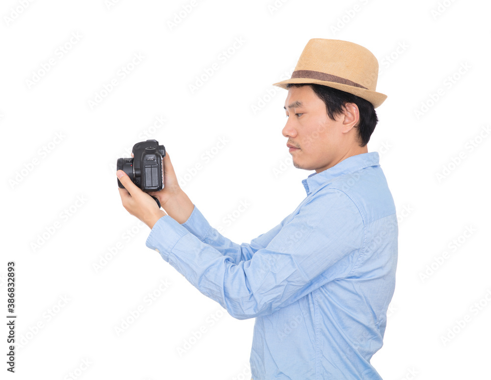 Male photographer holding DSLR camera in hand Male photographer holding DSLR camera in hand
