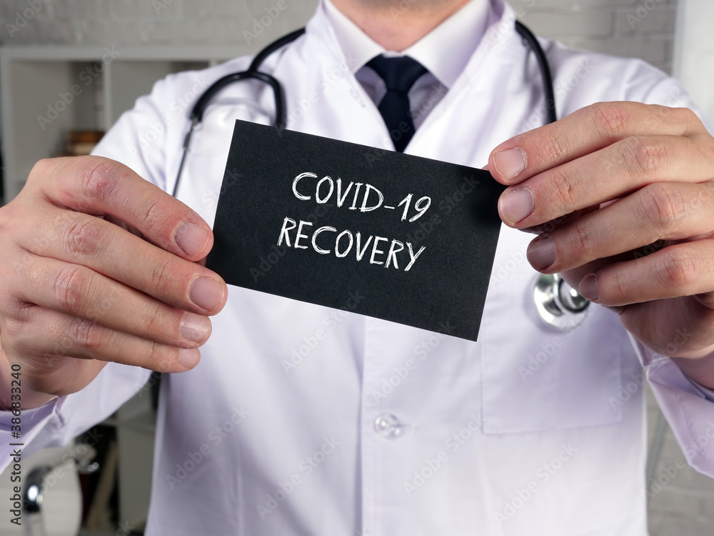 Health care concept meaning COVID-19 RECOVERY with phrase on the page. Health care concept meaning COVID-19 RECOVERY with phrase on the page.