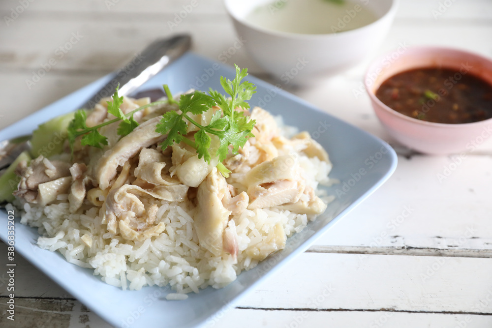 Thai food gourmet steamed chicken with rice in wood background Thai food gourmet steamed chicken with rice in wood background