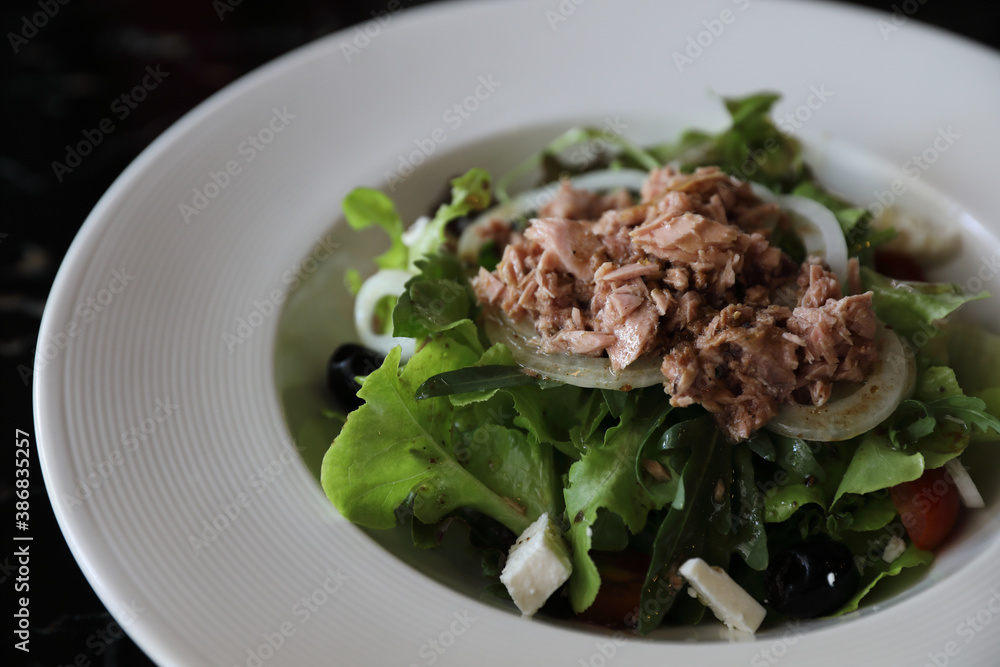 Tuna salad appetizer on wood background Tuna salad appetizer on wood background