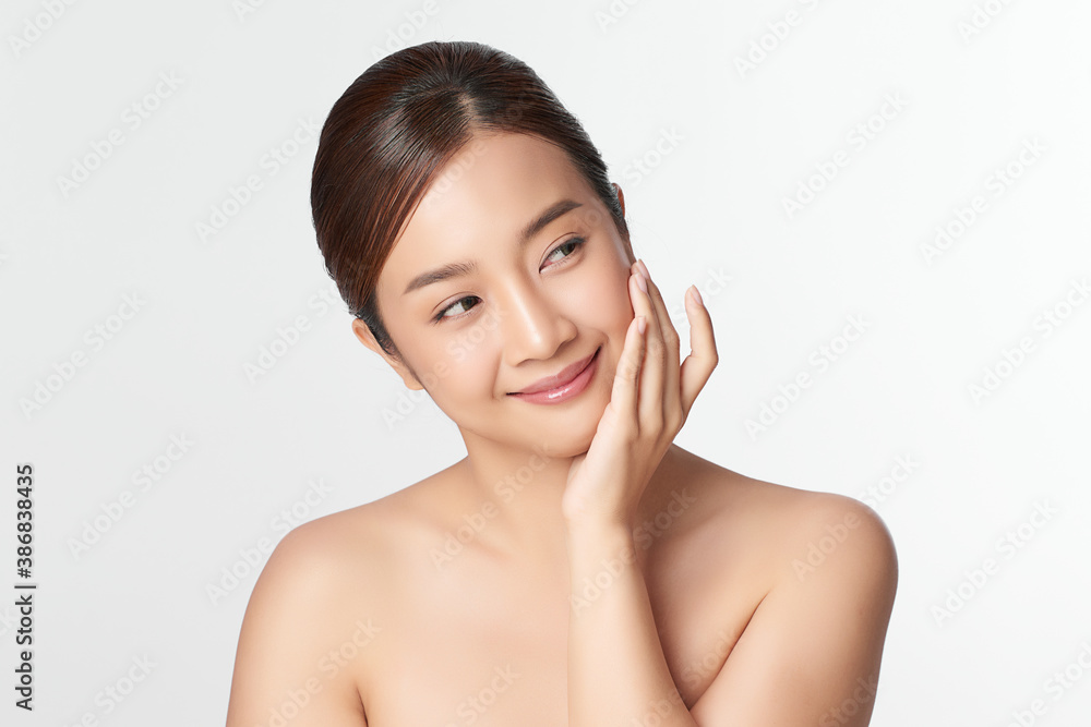 Beautiful young asian woman with clean fresh skin on white background, Face care, Facial treatment, Cosmetology, beauty and spa, Asian women portrait Beautiful young asian woman with clean fresh skin on white background, Face care, Facial treatment, Cosmetology, beauty and spa, Asian women portrait