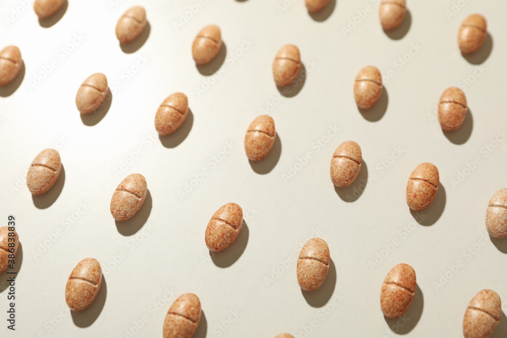 Flat lay with pills on gray background, close up Flat lay with pills on gray background, close up