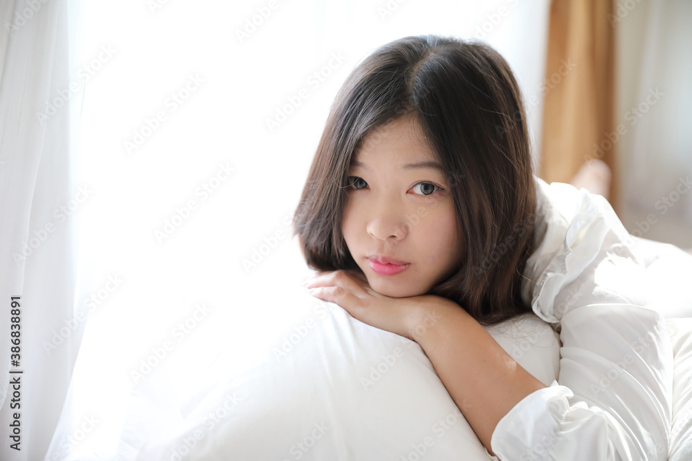 girl sleeping with pillow at white bedroom girl sleeping with pillow at white bedroom