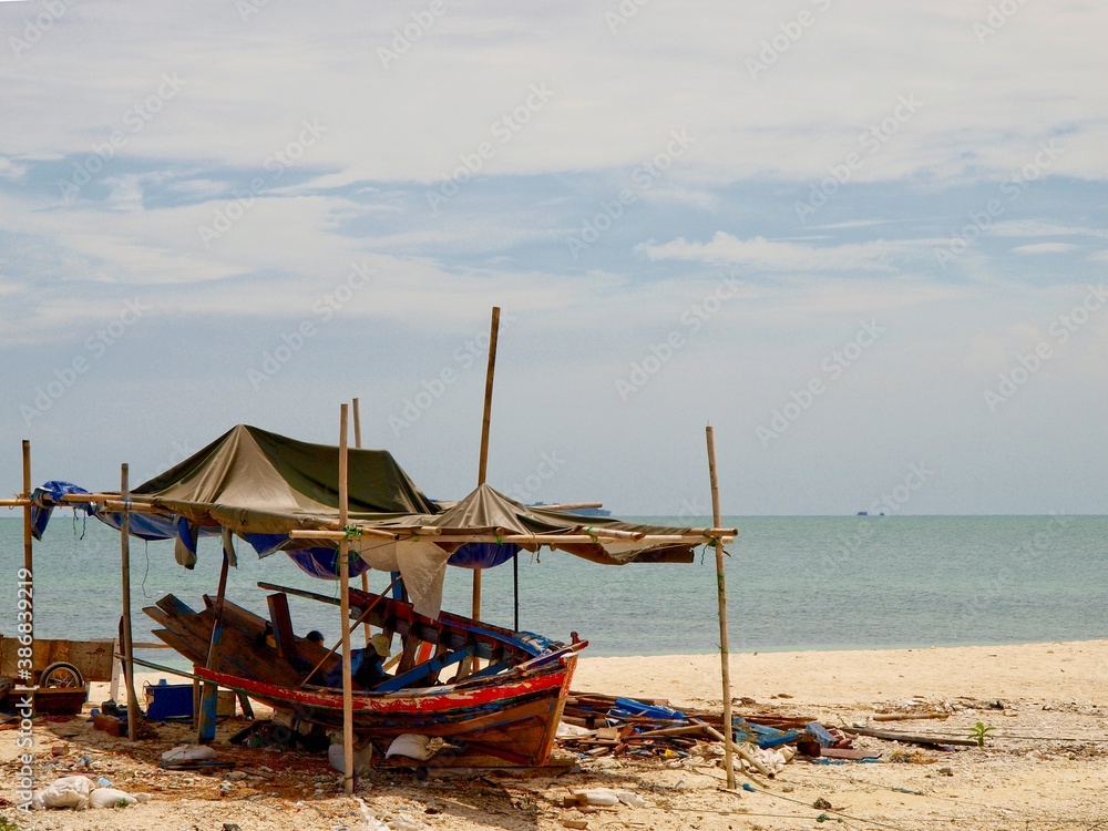  repairing the damaged ship on the shore