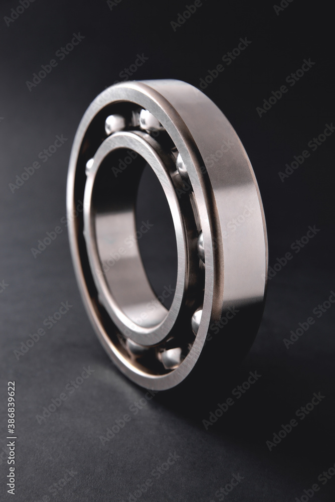 ball bearing on a black background close-up, blur as an artistic device ball bearing on a black background close-up, blur as an artistic device