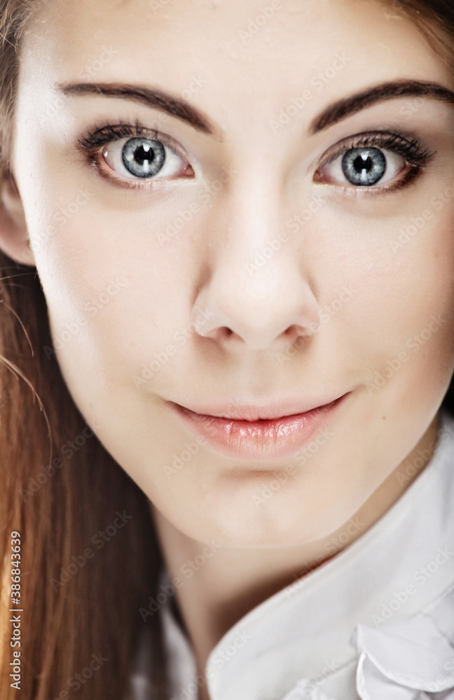 Face of a sexy beautiful young woman with clean skin on a white Face of a sexy beautiful young woman with clean skin on a white