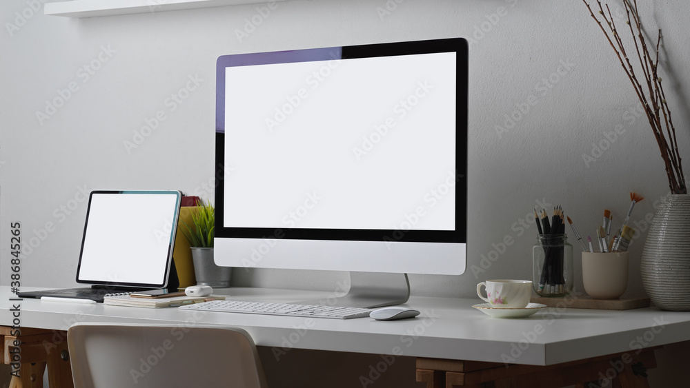 Fototapeta premium Home office desk with computer, tablet, supplies and decoration, include clipping path