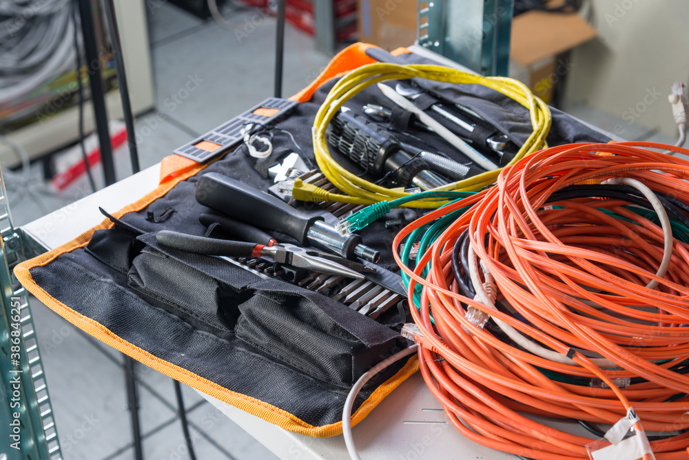 Fototapeta premium tool box with network cables of server administrator