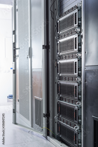 Racks filled with data storage hardware inside internet datacenter