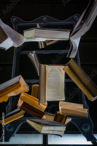 Many books flow off the bookshelf to you like a magic.