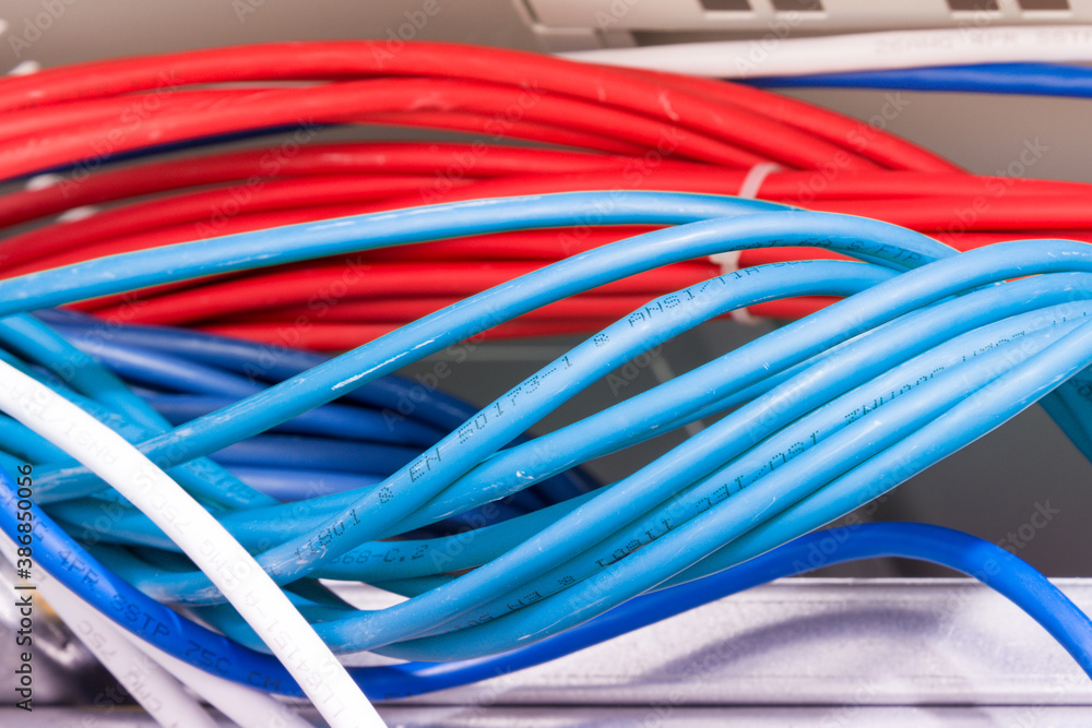 large group of UTP cables, Ethernet cables in rack cabinet large group of UTP cables, Ethernet cables in rack cabinet