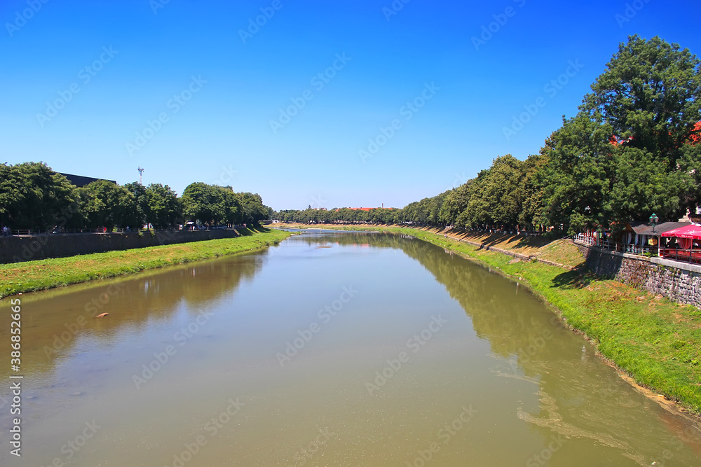 Panoramic view on the river Uzh in Uzhhorod. Transcarpathia, Western Ukraine. Panoramic view on the river Uzh in Uzhhorod. Transcarpathia, Western Ukraine.