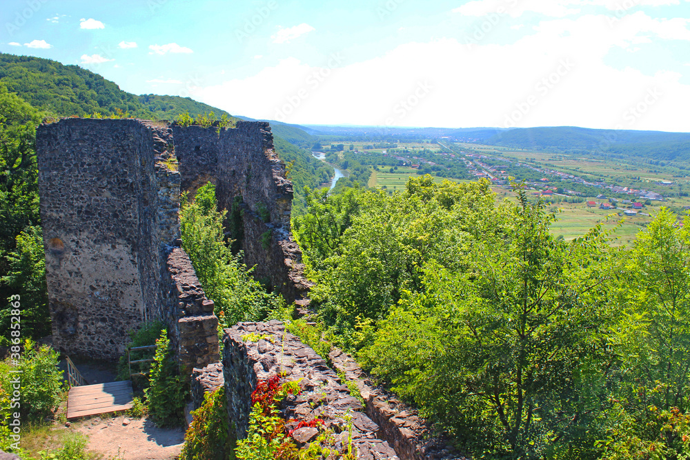 Naklejka premium Nevitsky castle is the pearl of Transcarpathia. The ruins of an ancient castle built in the 13th century. One of the most interesting castles near Uzhgorod, Zakarpattia region, Western Ukraine.