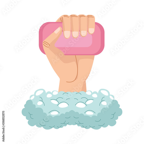 hand with soap bar product and foam