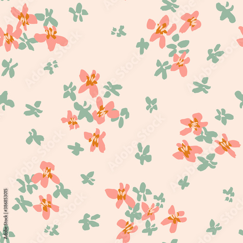 Painted ditsy floral scattered around in coral and mint green over blush pink background. Seamless vector pattern. Great for home decor, fabric, wallpaper, gift-wrap, stationery, and packaging project