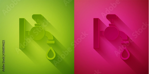 Paper cut Water tap icon isolated on green and pink background. Paper art style. Vector.