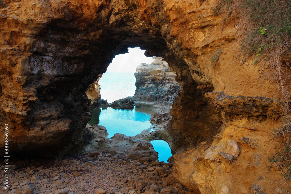 Looking through Natural Arch to the Sea