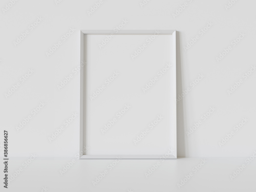 White frame leaning on white floor in interior mockup. Template of a picture framed on a wall 3D rendering White frame leaning on white floor in interior mockup. Template of a picture framed on a wall 3D rendering