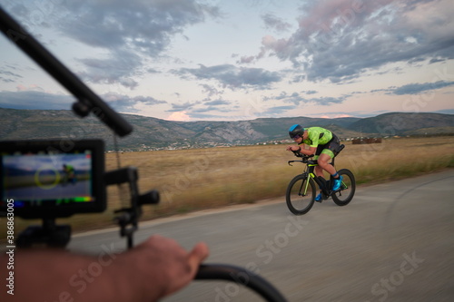 triathlon athlete riding a bike