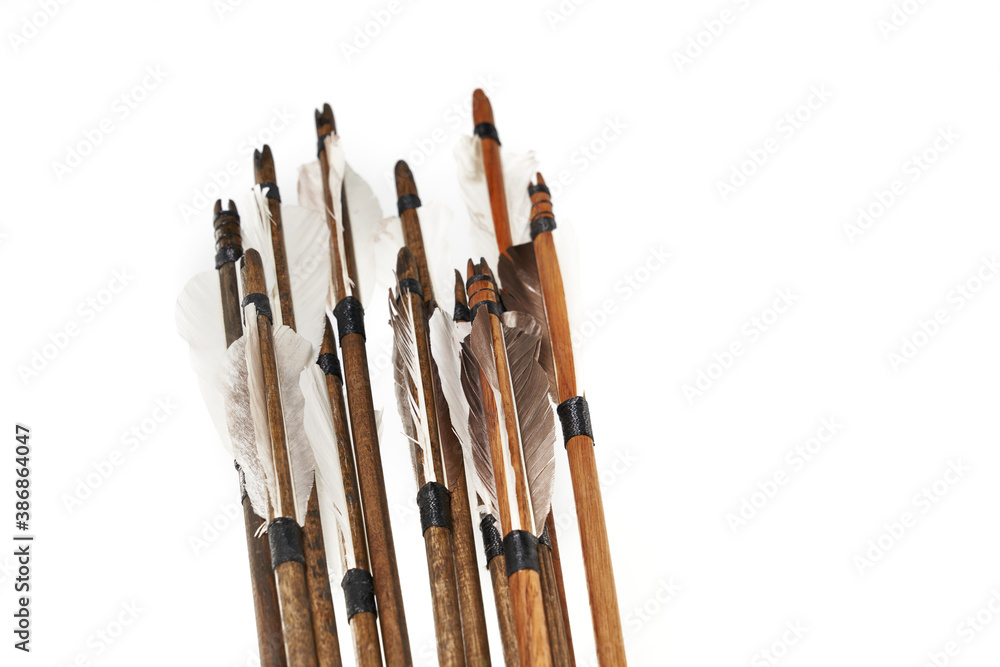 Ancient wooden aroows isolated on white. Ancient wooden aroows isolated on white.