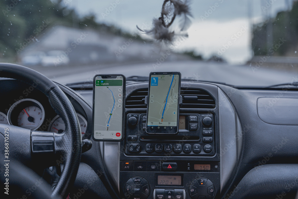 Car interior with the phones used as navigation devices