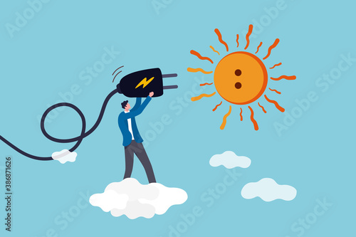 Solar sunlight energy, ecology natural power and energy to save the world concept, engineer solar technology worker holding electric plug to plug into the sun idea to get sustainable electricity.