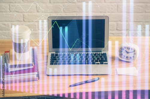 Double exposure of forex chart and work space with computer. Concept of international online trading. © peshkova