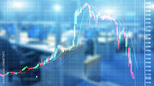 Blurred office with stock market falling graph