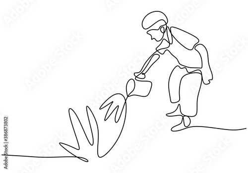 Single continuous line drawing of a son watering a plant at home garden. Happy little boy learning to care for plants and watering to make it growing isolated on white background. Vector illustration