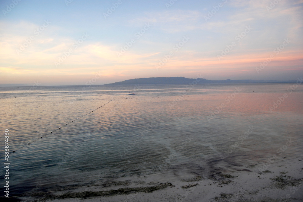 panoramic sunrise  in pastel colours on a tropical island