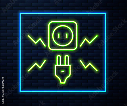 Glowing neon line Connecting electric plug with electricity spark icon isolated on brick wall background. Vector.