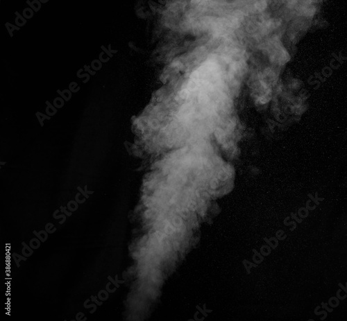 White smoke on black background. Abstract background, design element, for overlay on pictures