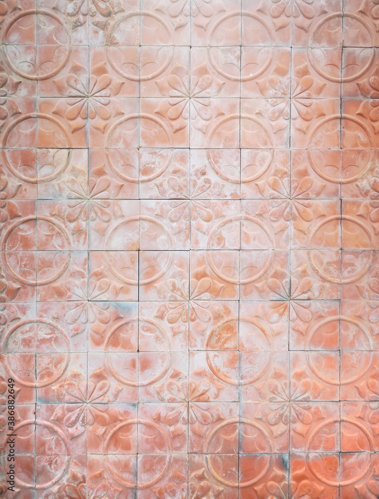 Pattern and Background : Decorative brick, orange tone colour terracotta tiles wall 