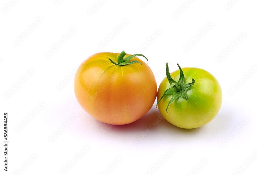 Yellow and green tomatoes isolated on a white background. Healthy food. Vegan food. Organic tomatoes Yellow and green tomatoes isolated on a white background. Healthy food. Vegan food. Organic tomatoes