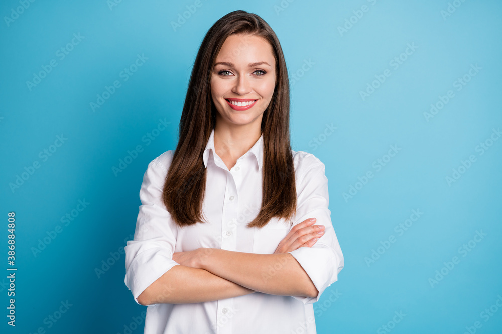 Photo of attractive business lady arms crossed good mood wear white shirt isolated blue color background - obrazy, fototapety, plakaty 