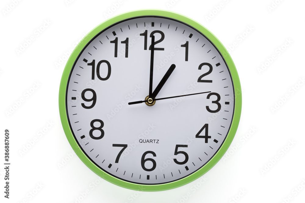 One o'clock. Wall clock on white background. Clipping path included. One o'clock. Wall clock on white background. Clipping path included.