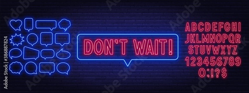 Don't wait neon sign on a brick background. Red neon alphabet. Template for a design with speech bubble frames.