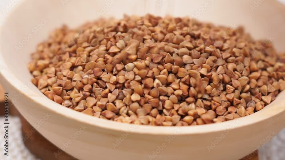 buckwheat macro view on rustic background. gluten free ancient grain for healthy diet, selective focus buckwheat macro view on rustic background. gluten free ancient grain for healthy diet, selective focus