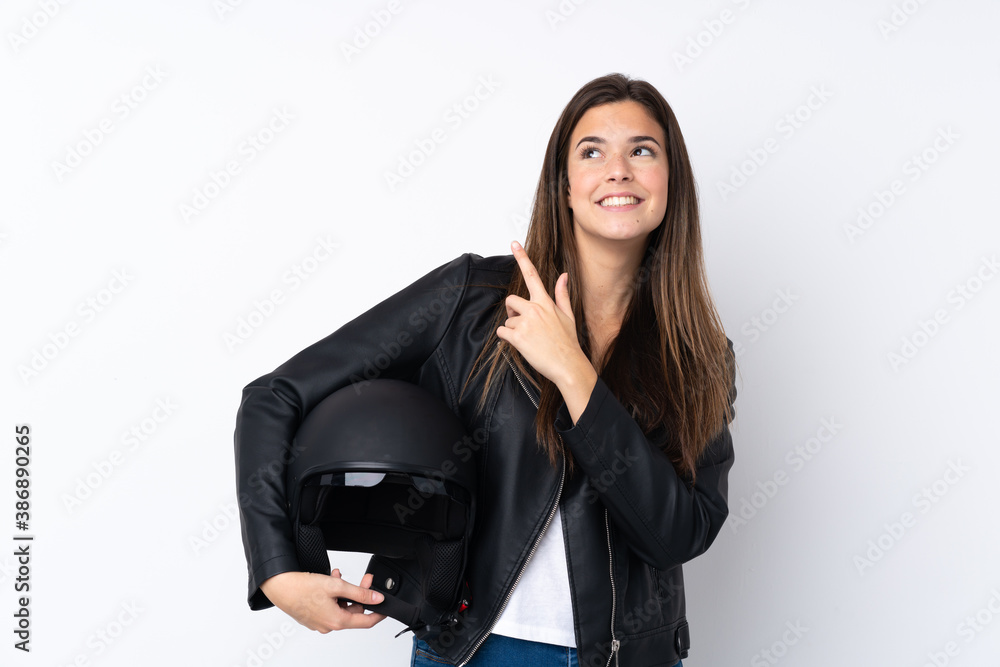 Young woman with a motorcycle helmet over isolated white background pointing with the index finger a great idea Young woman with a motorcycle helmet over isolated white background pointing with the index finger a great idea