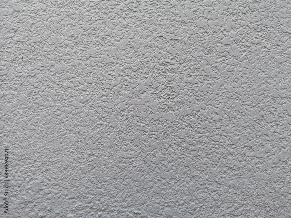 Paint white color on the Cement wall abstract rough surface texture concrete material background Paint white color on the Cement wall abstract rough surface texture concrete material background