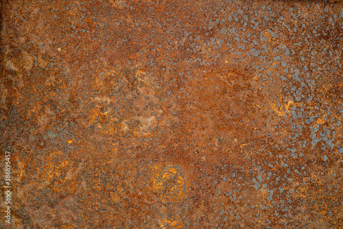 Old rusty textured metal background.
